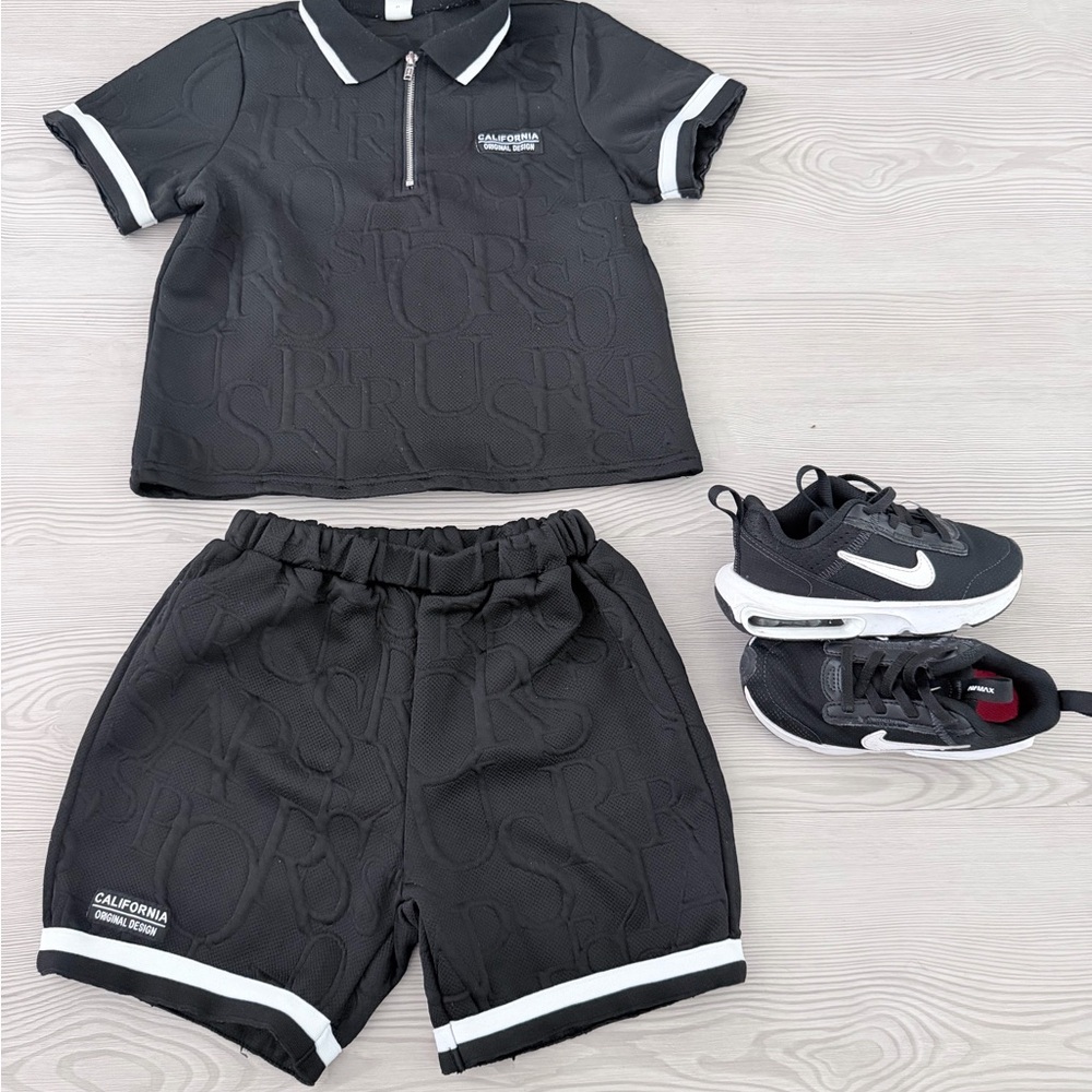 Black Two-Piece Short Set with White Trim and Nike sneakers